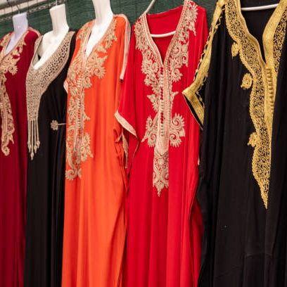 Colorful, richly embroidered Arabic kaftans at a market
